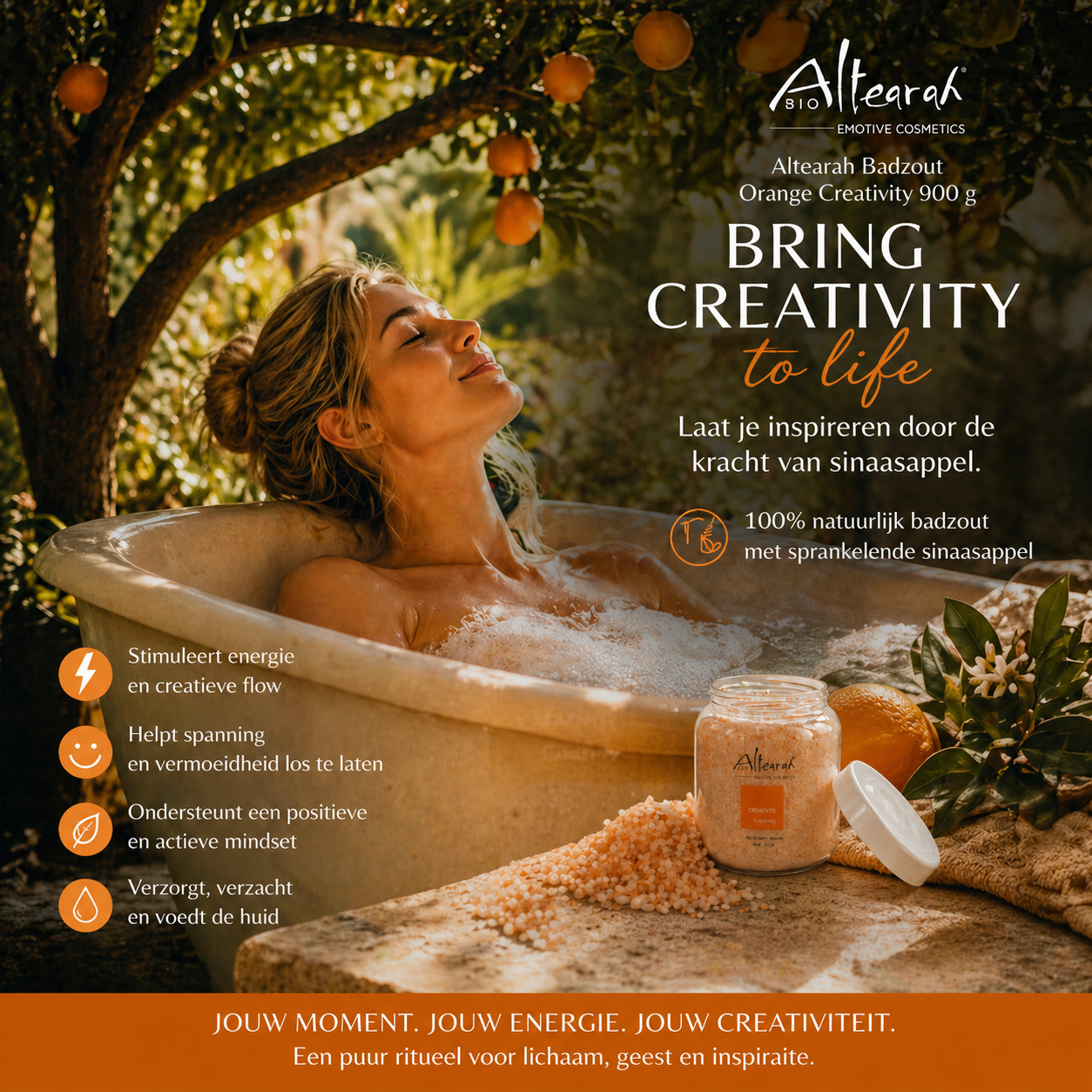 Vrouw ontspant in bad onder sinaasappelboom met Altearah Orange Creativity badzout en open pot mineraalzout