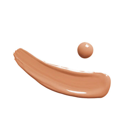 Gros plan de la base de maquillage Couleur Caramel Caramel et de son éclat doux