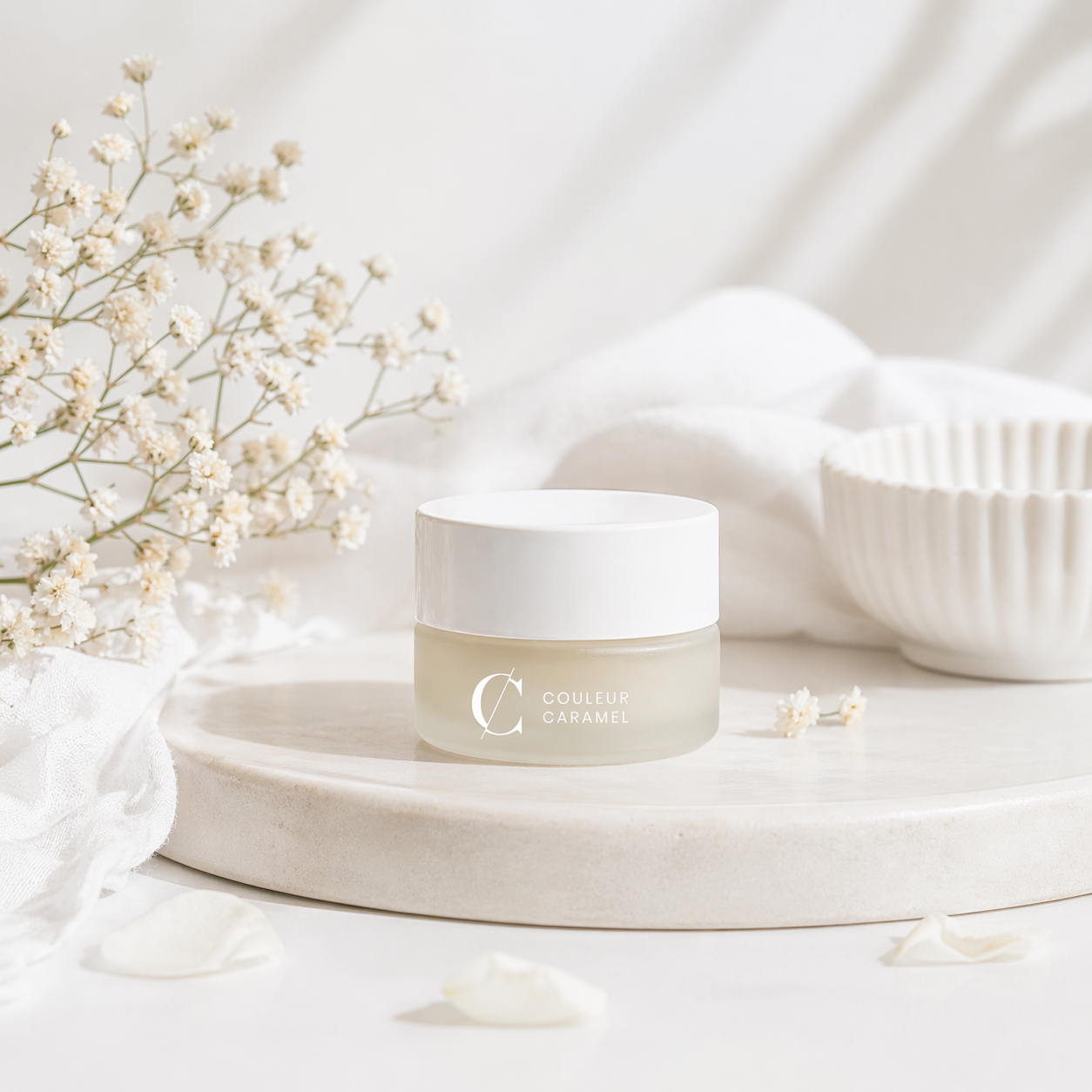 Couleur Caramel lip balm hydratatie rust zachte verzorging witte bloemen